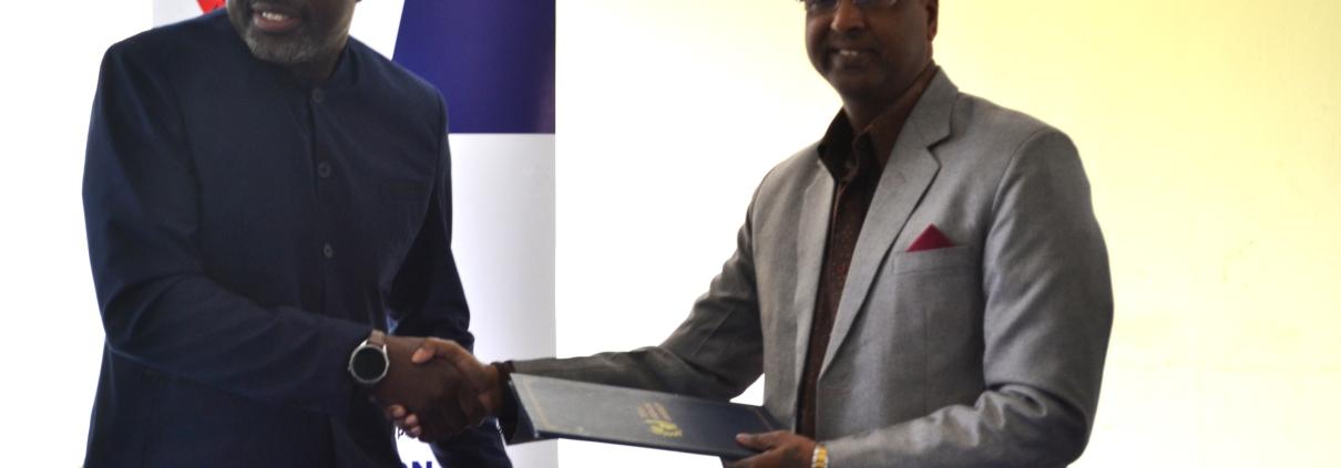 ZUNMO President Fray Michelo (left) with TAU Z Vice Chancellor Prof. (Dr.) Ajay Kumar Poddar during the signing ceremony at ZUNMO Headquarters in Lusaka.