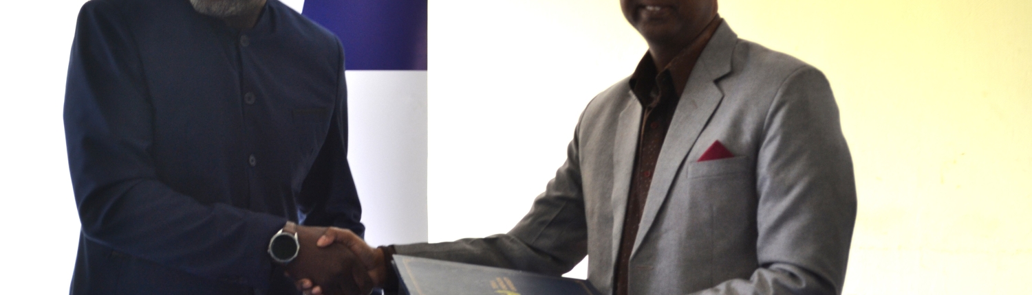 ZUNMO President Fray Michelo (left) with TAU Z Vice Chancellor Prof. (Dr.) Ajay Kumar Poddar during the signing ceremony at ZUNMO Headquarters in Lusaka.