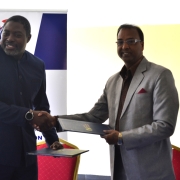 ZUNMO President Fray Michelo (left) with TAU Z Vice Chancellor Prof. (Dr.) Ajay Kumar Poddar during the signing ceremony at ZUNMO Headquarters in Lusaka.