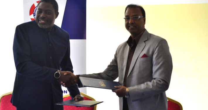 ZUNMO President Fray Michelo (left) with TAU Z Vice Chancellor Prof. (Dr.) Ajay Kumar Poddar during the signing ceremony at ZUNMO Headquarters in Lusaka.