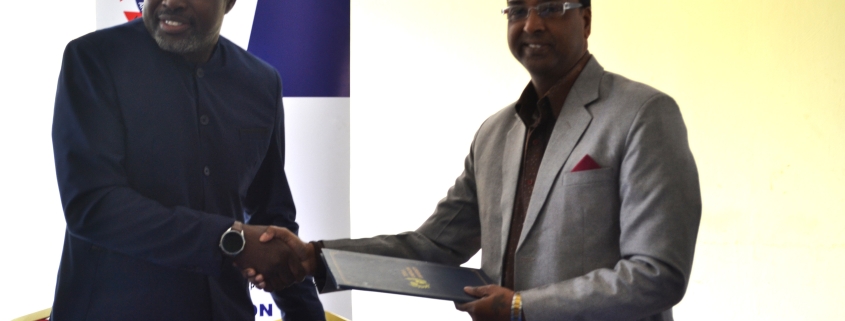 ZUNMO President Fray Michelo (left) with TAU Z Vice Chancellor Prof. (Dr.) Ajay Kumar Poddar during the signing ceremony at ZUNMO Headquarters in Lusaka.